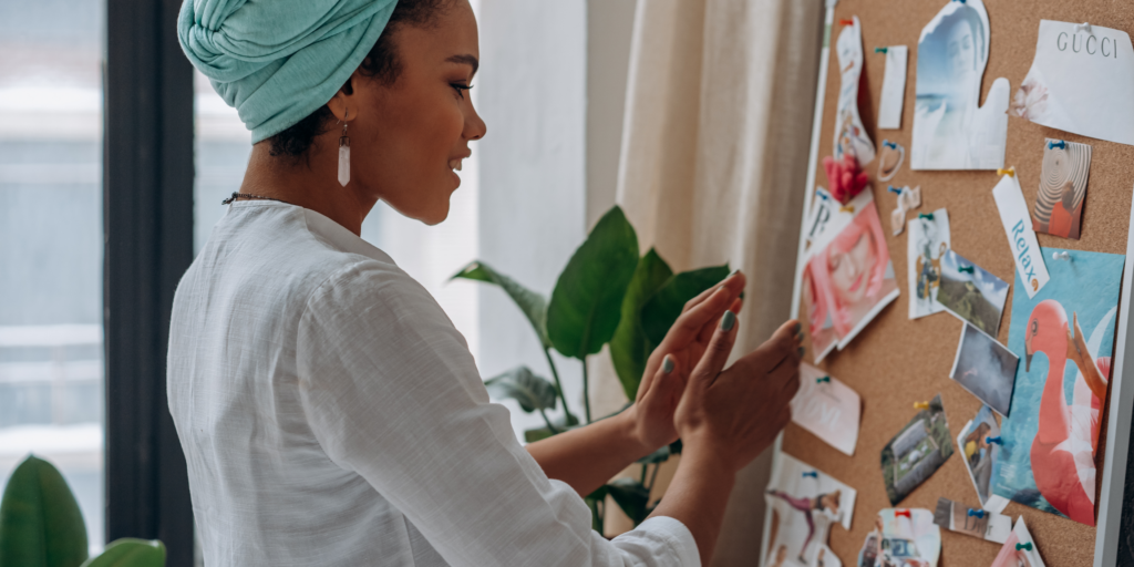 Woman creating a vision board