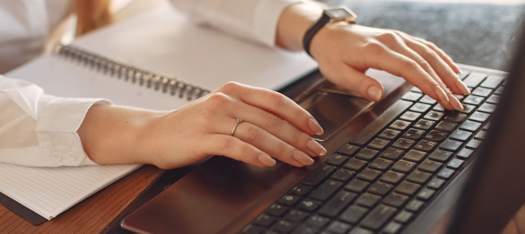 Hands typing on computer. Small Business Digital Ready: Free Digital Trainings